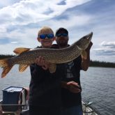 Father and Son Fishing for Northern Pike