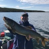 Man Holding Trophy Northern Pike