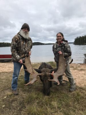 Chuck and Beth with Moose