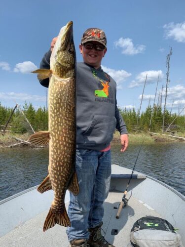 Young Man with Large Fish