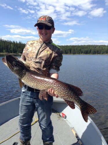 Young Man with Large Fish