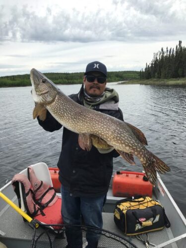 Guy Proudly Displaying Fish