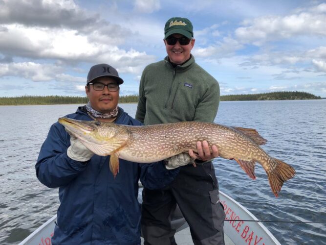2 Men Show Northern Pike caught in Reindeer Lake